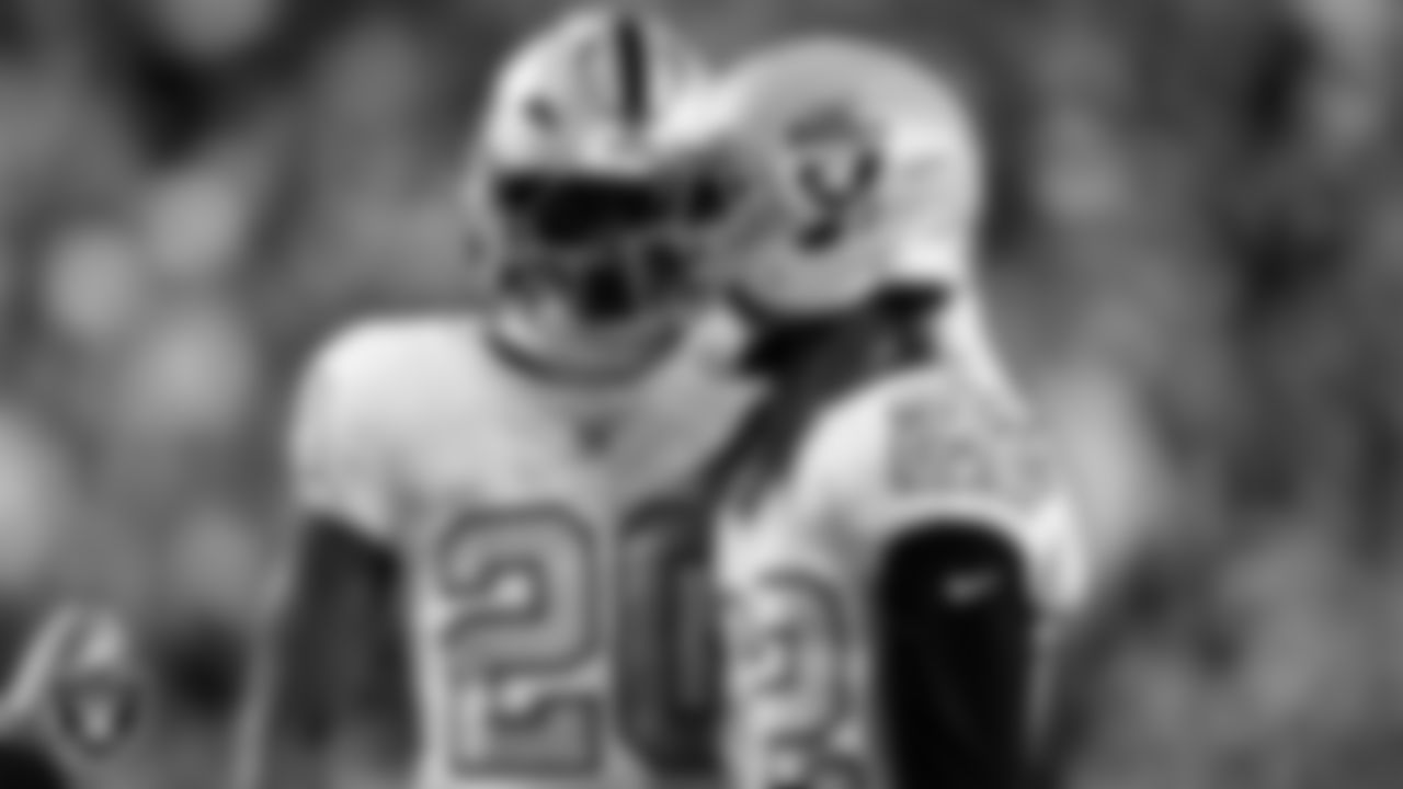 Las Vegas Raiders safety Isaiah Pola-Mao (20) and cornerback Eric Stokes (22) during the regular season away game against the Denver Broncos at Empower Field at Mile High.