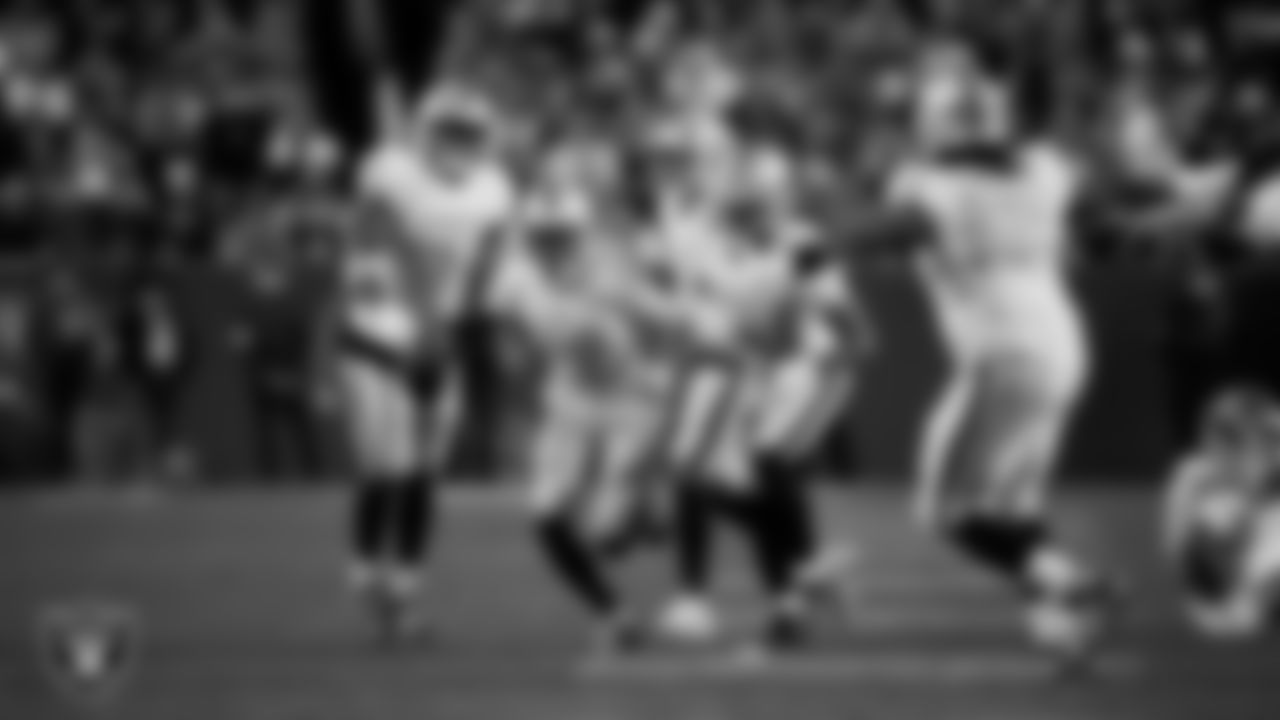 Las Vegas Raiders cornerback Kyu Blu Kelly (36) celebrates with teammates after intercepting a pass during the regular season away game against the Denver Broncos at Empower Field at Mile High.