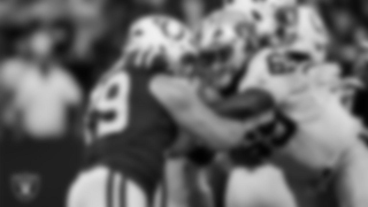 Las Vegas Raiders defensive tackle Adam Butler (69) defends during the regular season away game against the Indianapolis Colts at Lucas Oil Stadium.