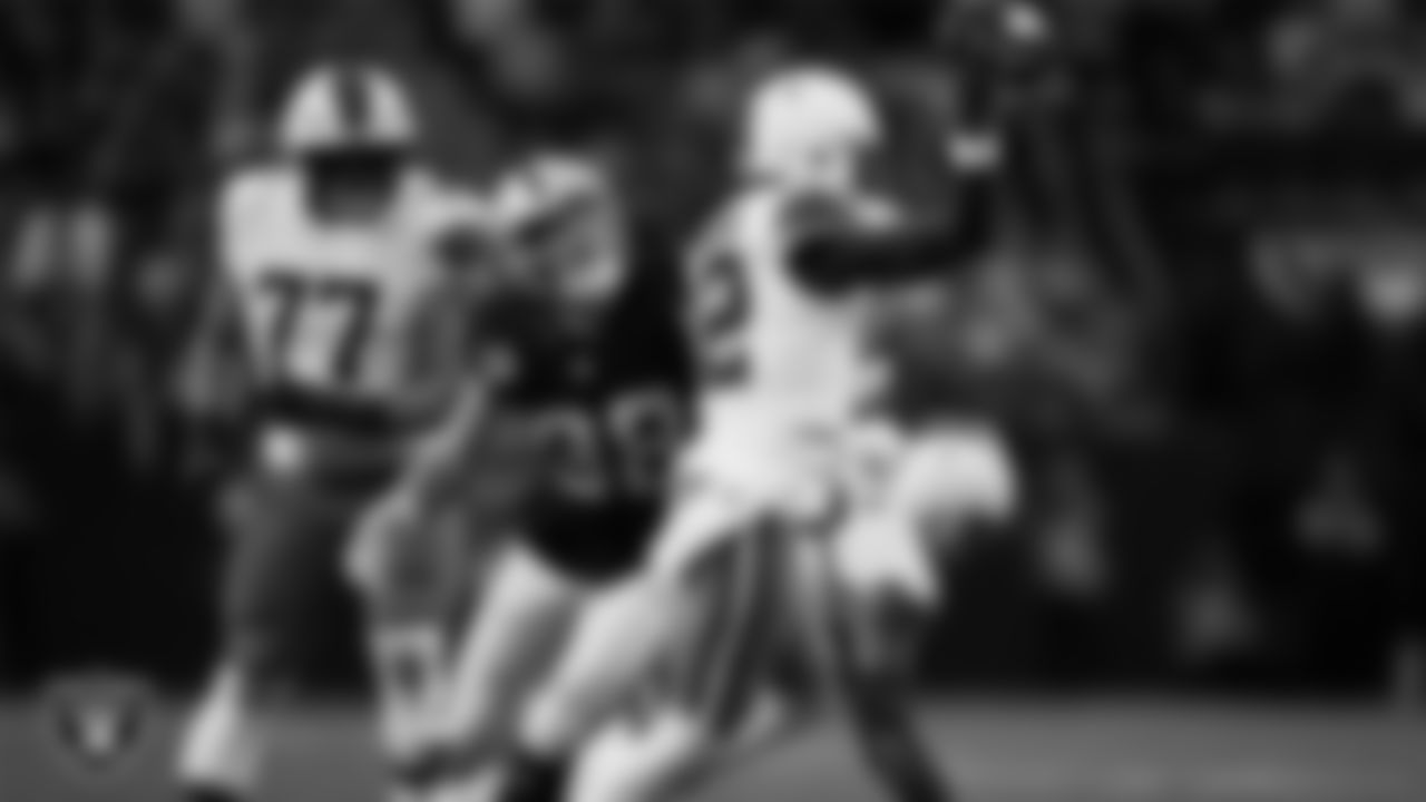 Las Vegas Raiders defensive end Maxx Crosby (98) pressures the quarterback during the regular season home game against the Cleveland Browns at Allegiant Stadium.