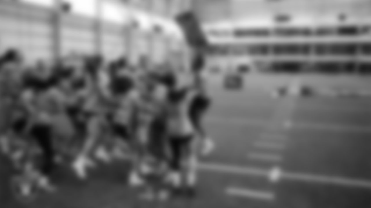 The winners of the relay race celebrate during a Nike 11-On event at Intermountain Health Performance Center.