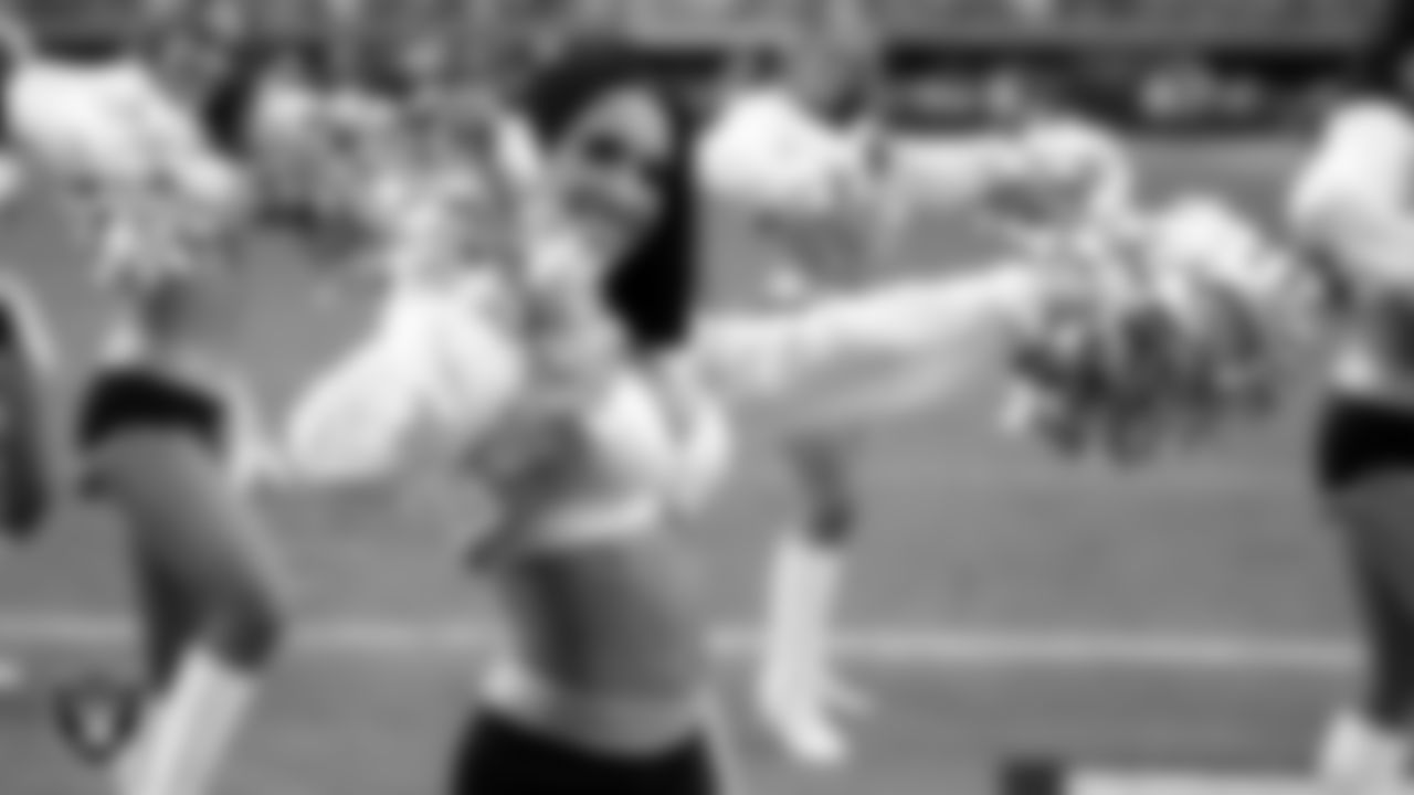 Raiderette Kylie performs on the field during the preseason home game against the San Francisco 49ers at Allegiant Stadium.