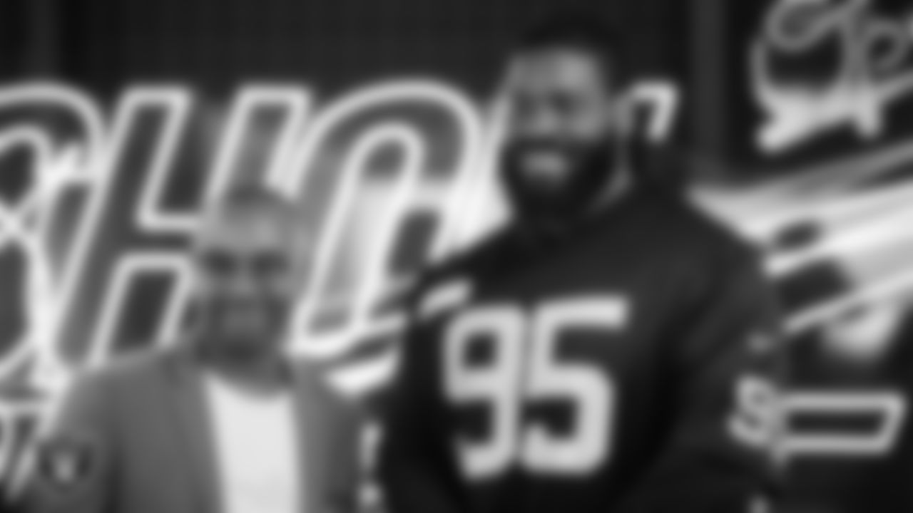 Las Vegas Raiders defensive tackle John Jenkins (95) meets with representatives from the Avery Burton Foundation to design cleats for My Cause My Cleats at Shoe Palace Corporate Offices.
