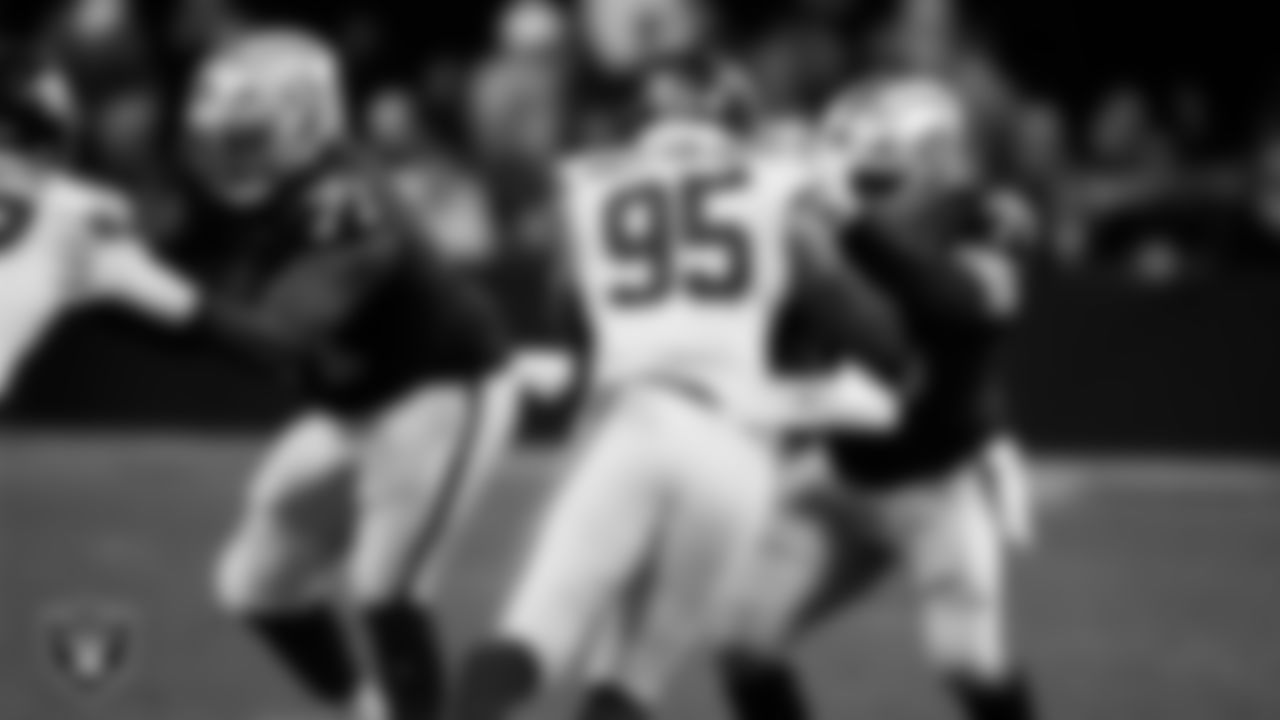 Las Vegas Raiders tackle DJ Glaze (71) and guard Caleb Rogers (76) block during the regular season home game against the New York Giants at Allegiant Stadium.