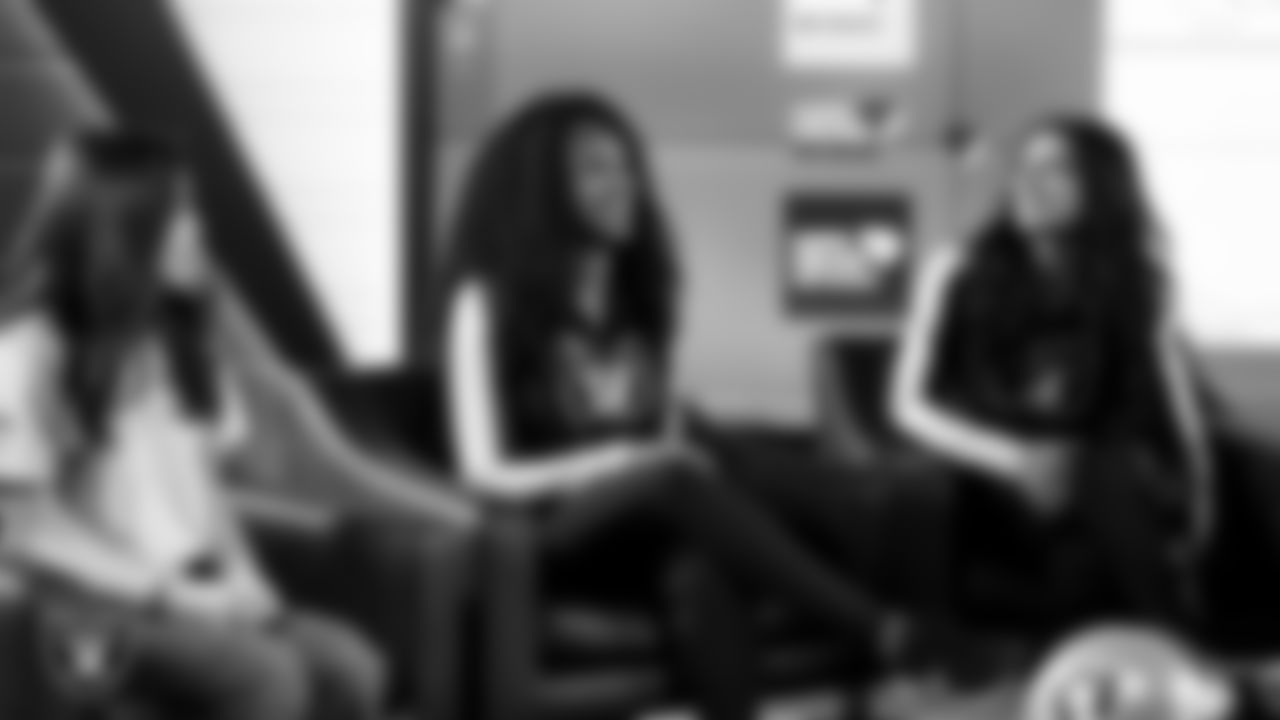 Raiderettes Shayla and Kylee meet with representatives from Hope Means Nevada and designers to design custom boots for the NFL's My Cause My Cleats initiative in Cox Studios at Intermountain Health Performance Center.