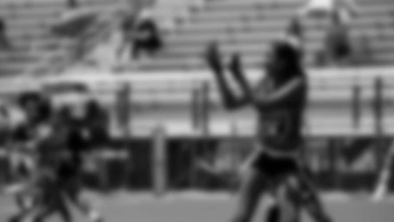 Athletes compete during a girls division Silver and Black League playoff game at Western High School.