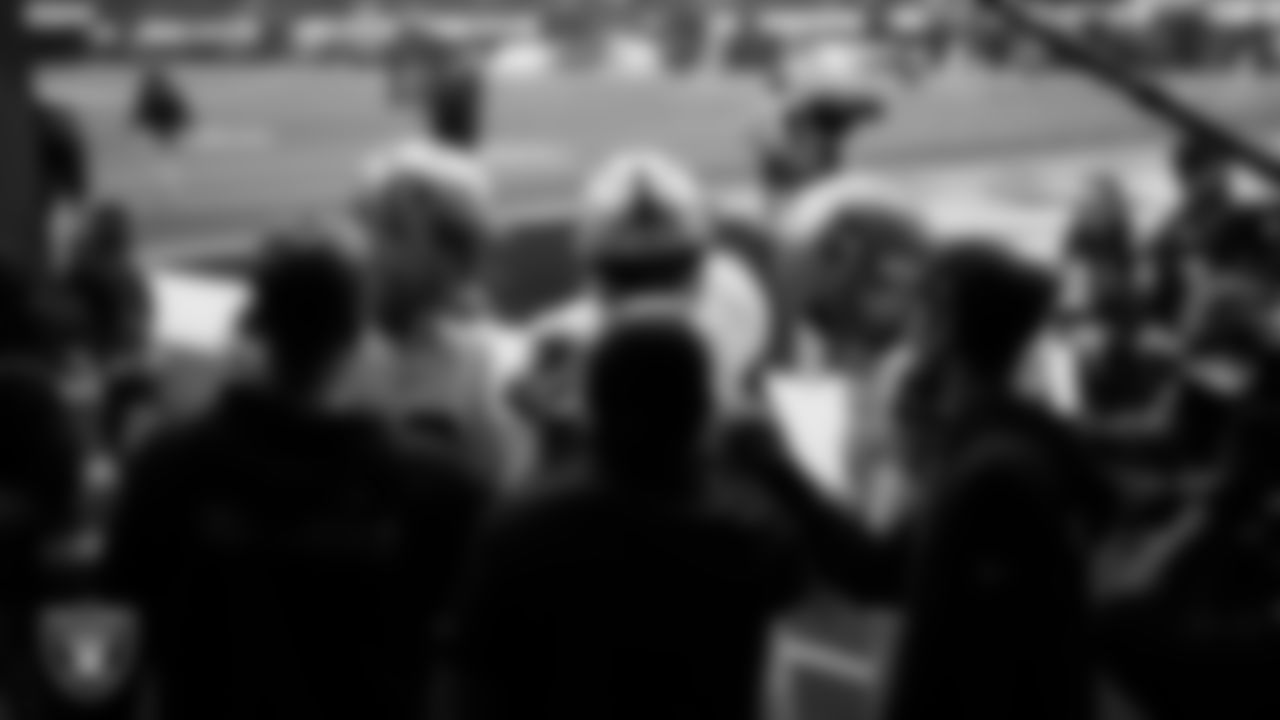 The Las Vegas Raiders quarterbacks huddle in the tunnel before the regular season away game against the Los Angeles Chargers at SoFi Stadium.