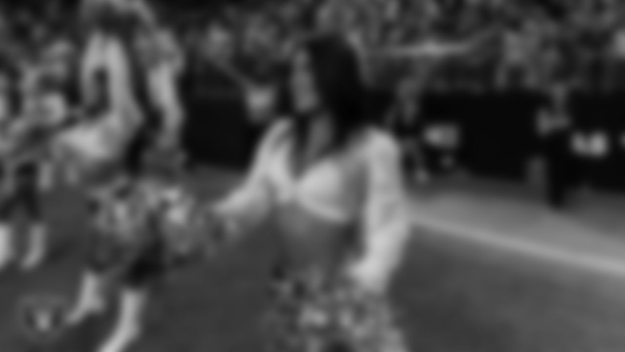 Raiderette Macy on the sidelines during the regular season home game against the Los Angeles Chargers at Allegiant Stadium.