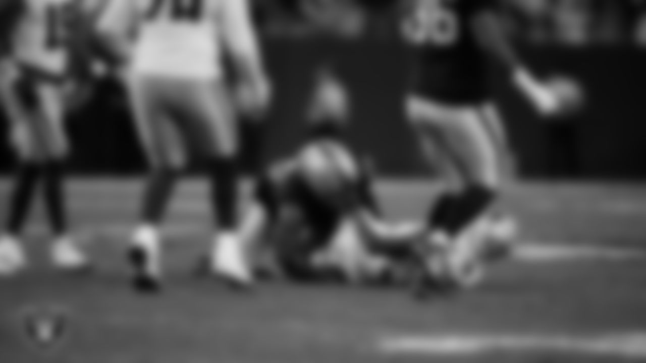 Las Vegas Raiders linebacker Devin White (45) makes a tackle during the regular season home game against the Dallas Cowboys at Allegiant Stadium.