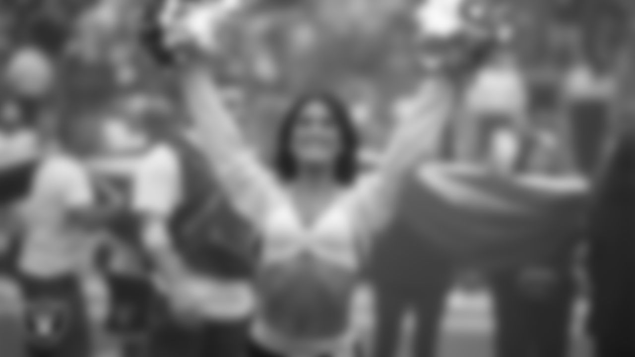 Raiderette Macy during player introductions before the preseason home game against the San Francisco 49ers at Allegiant Stadium.