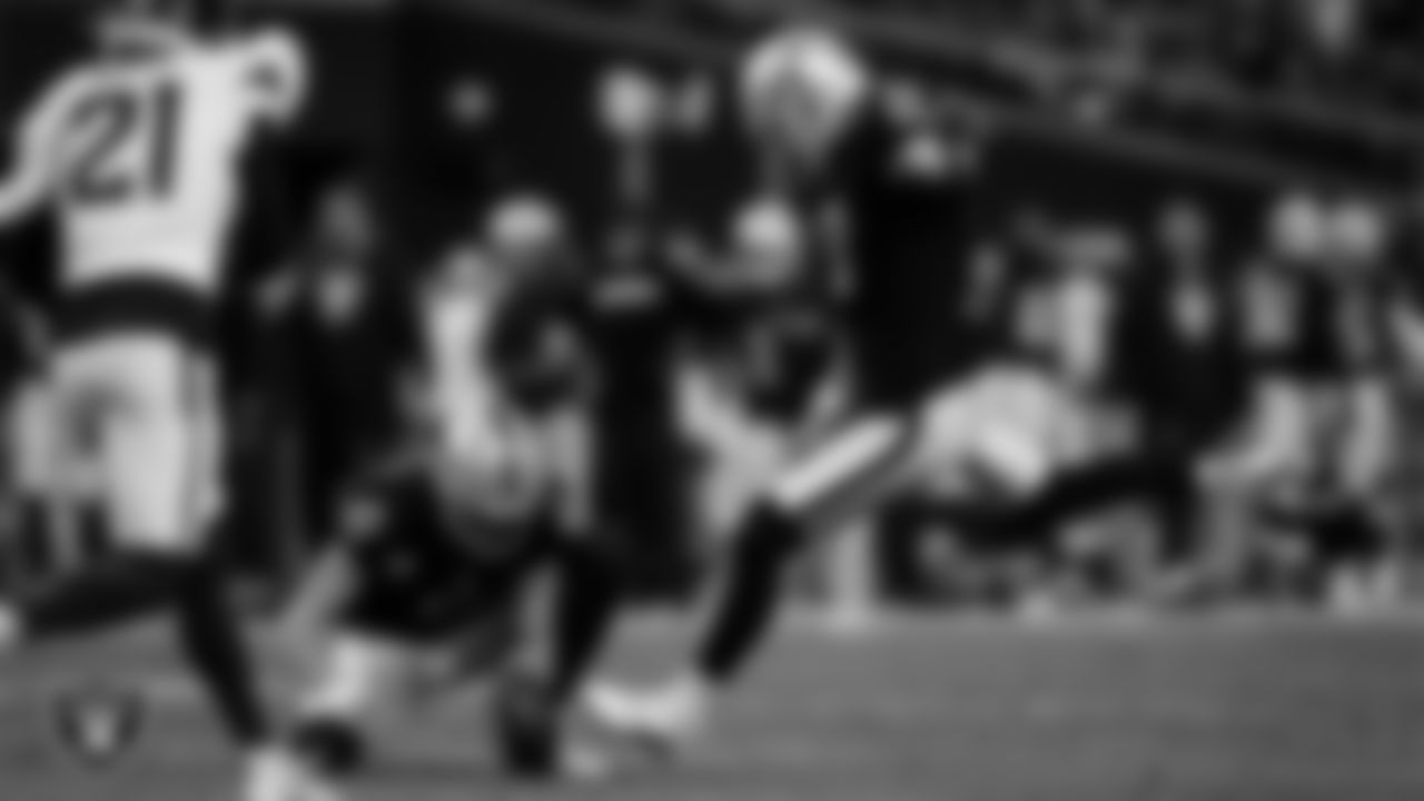 Las Vegas Raiders kicker Daniel Carlson (8) kicks a PAT during the regular season home game against the Denver Broncos at Allegiant Stadium.