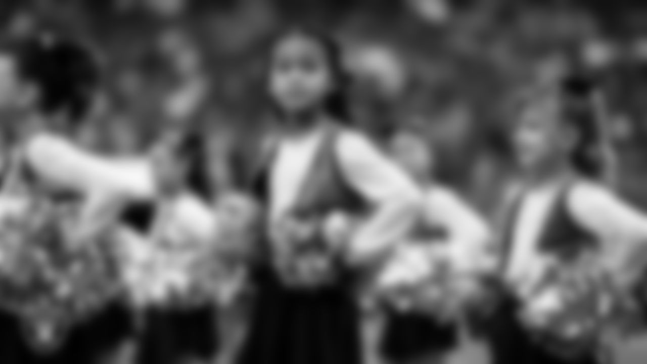 Junior Raiderettes perform on the field before the preseason home game against the San Francisco 49ers at Allegiant Stadium.