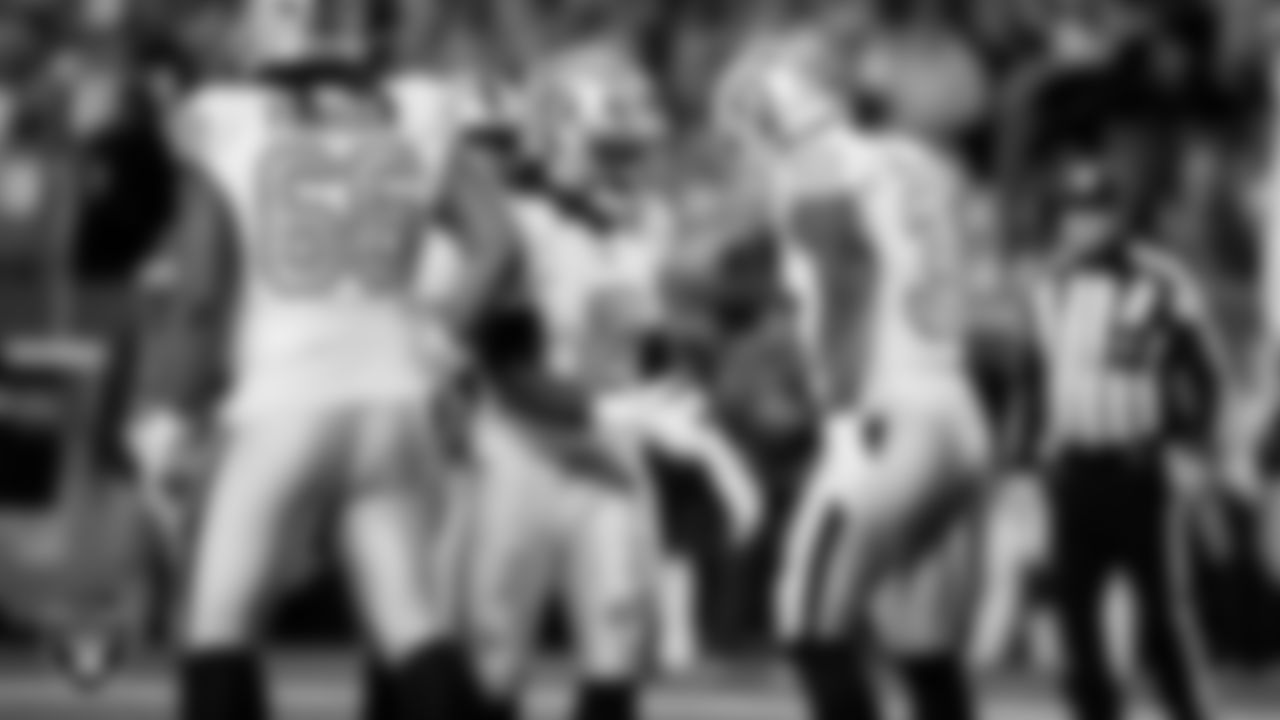 Las Vegas Raiders running back Ashton Jeanty (2) celebrates with running back Raheem Mostert (31) after rushing for a 4-yard touchdown during the regular season away game against the Denver Broncos at Empower Field at Mile High.