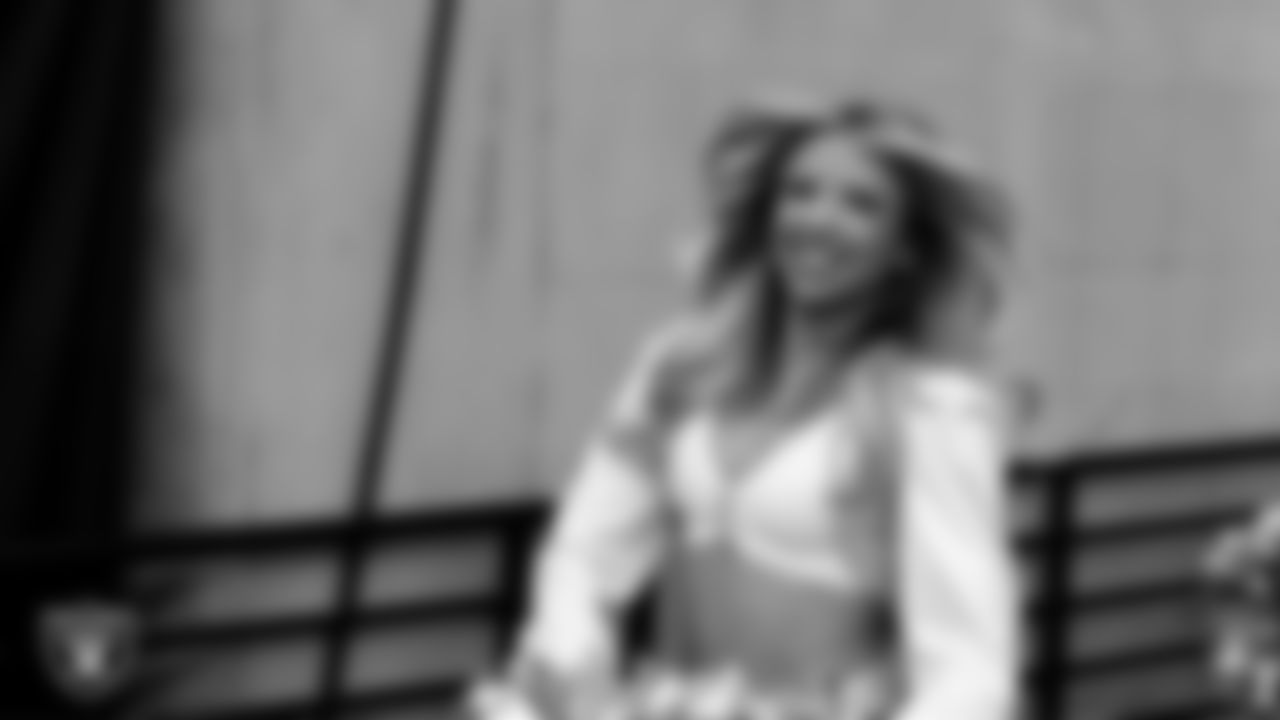 Raiderette Jordie walks through the tunnel before the regular season home game against the Cleveland Browns at Allegiant Stadium.