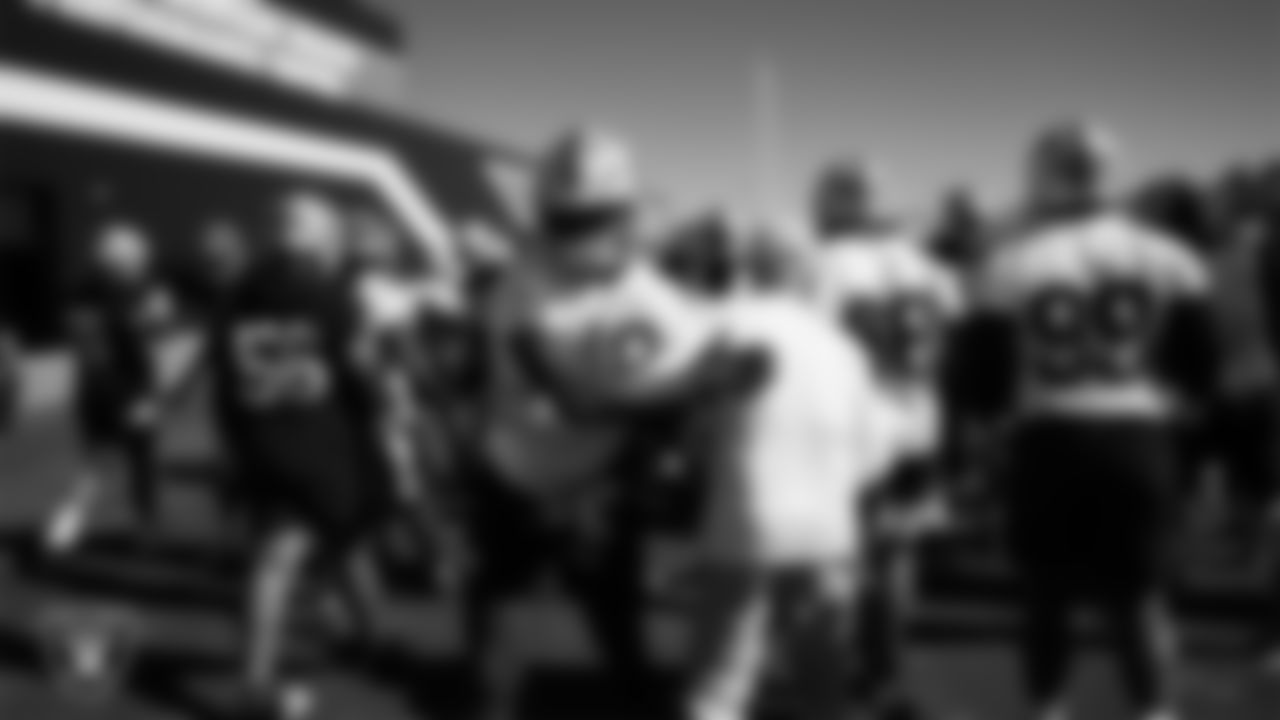 Las Vegas Raiders linebacker Jamin Davis (48) and Head Coach Pete Carroll during practice at Intermountain Health Performance Center.