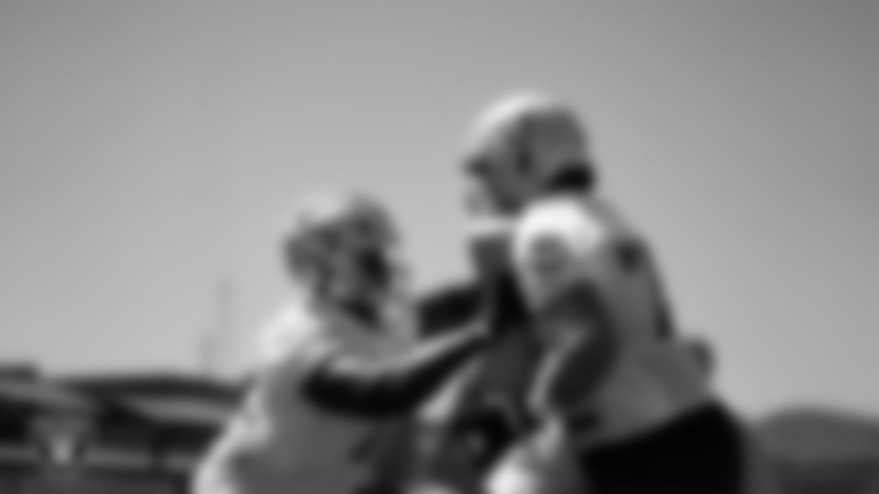 Las Vegas Raiders tackle Gottlieb Ayedze (72) and tackle Dalton Wagner (78) on the field for mandatory minicamp at Intermountain Health Performance Center.