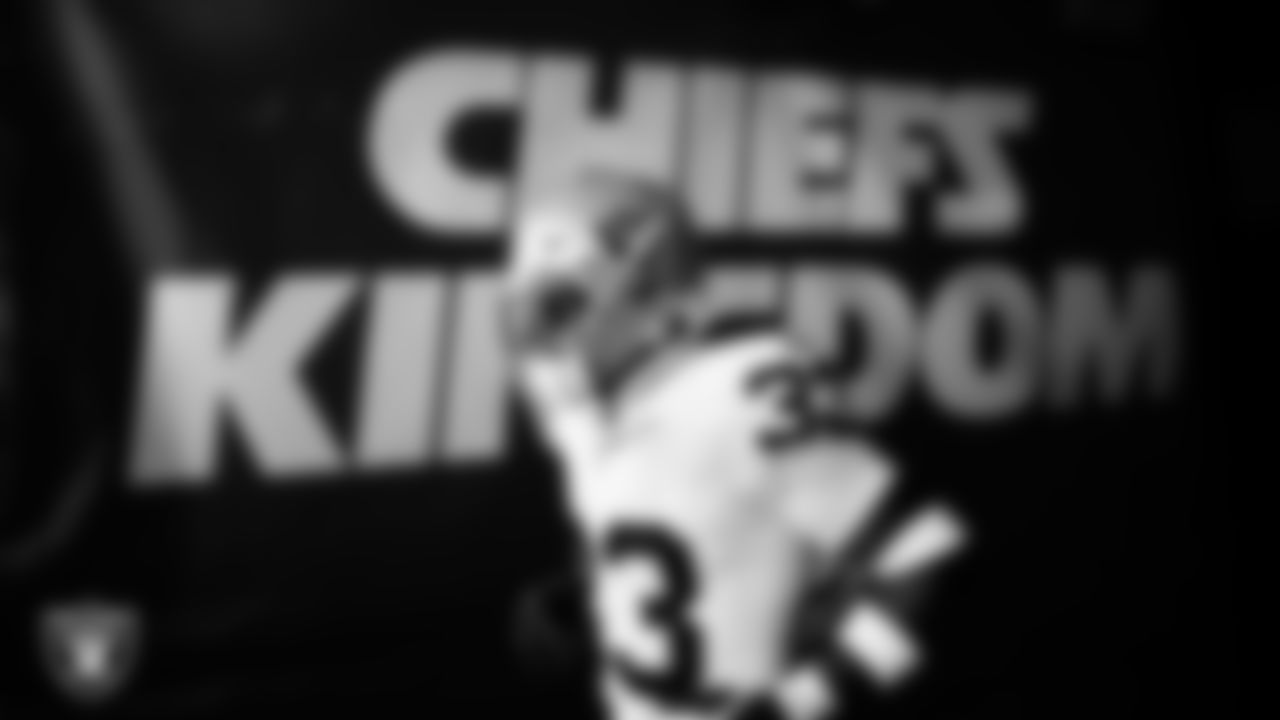 Las Vegas Raiders linebacker Jamal Adams (33) runs down the tunnel before the regular season away game against the Kansas City Chiefs at GEHA Field at Arrowhead Stadium.