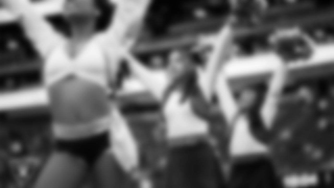 Junior Raiderettes perform on the field before the preseason home game against the San Francisco 49ers at Allegiant Stadium.