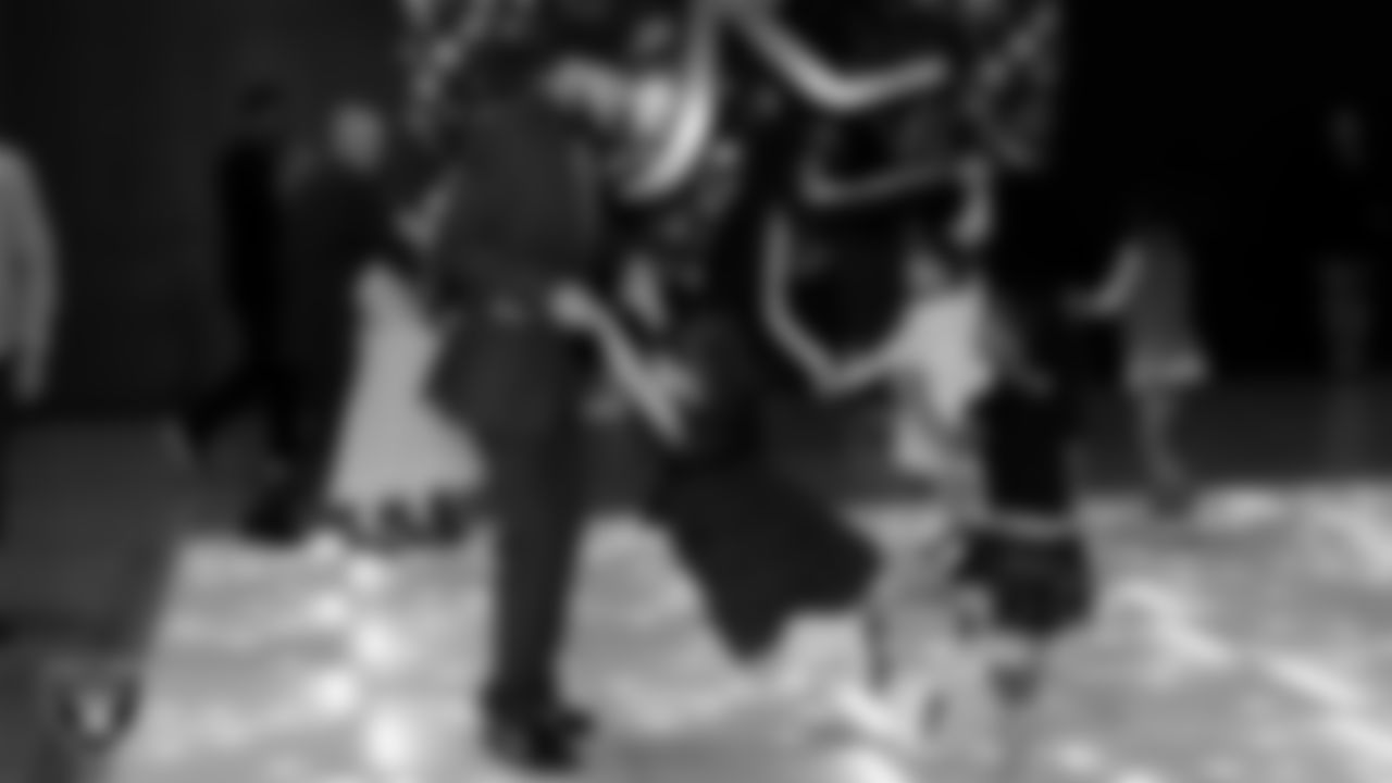 Attendees dance during the Valentine's Day Dance at The Studio.