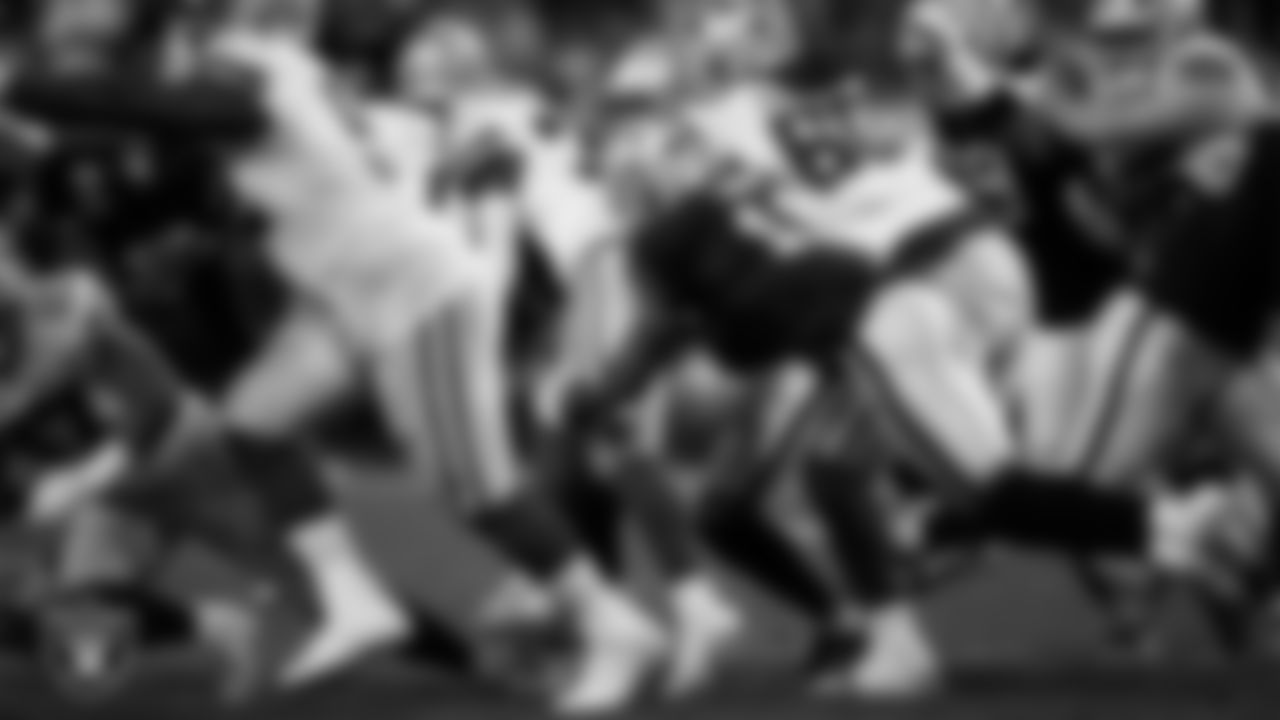 Las Vegas Raiders safety Jeremy Chinn (11) makes a tackle during the regular season home game against the Dallas Cowboys at Allegiant Stadium.