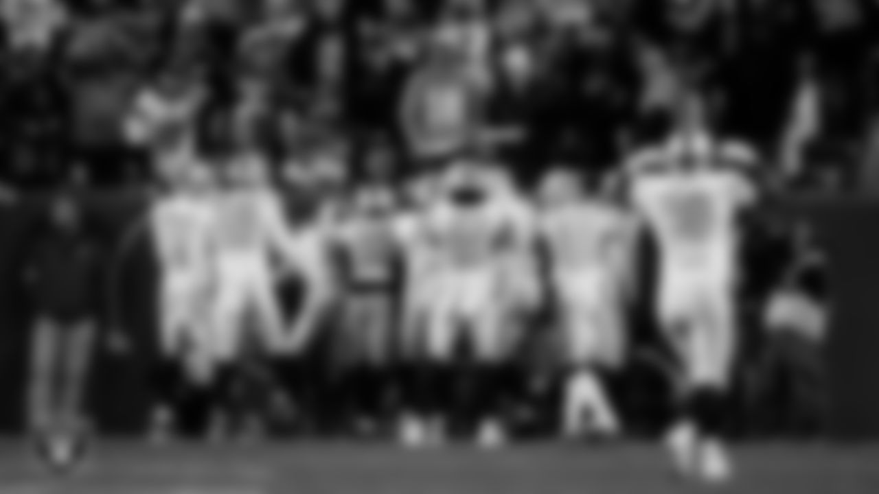 Las Vegas Raiders cornerback Kyu Blu Kelly (36) celebrates with teammates after intercepting a pass during the regular season away game against the Denver Broncos at Empower Field at Mile High.