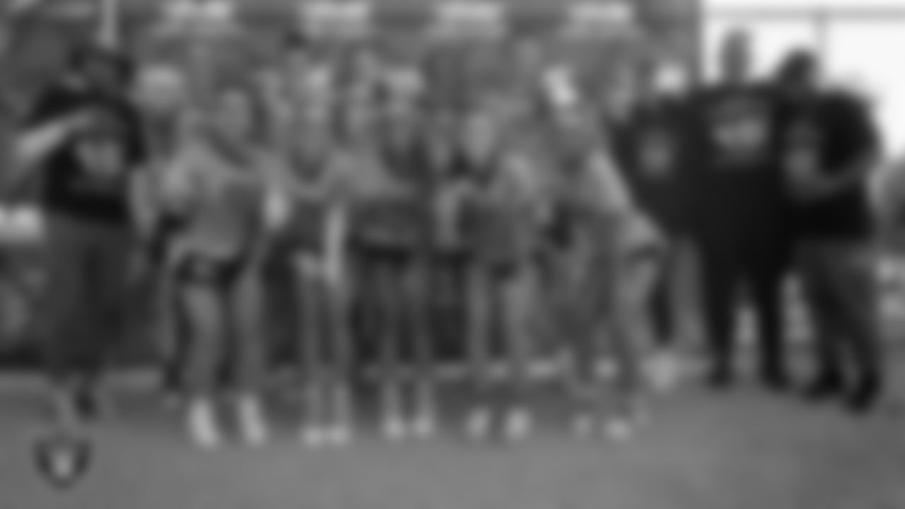 The High School Girls Apex Predators Black pose for a photo after winning the 2024 NFL FLAG Regional Championships and advancing to the 2024 NFL FLAG Championship at Heritage Park.