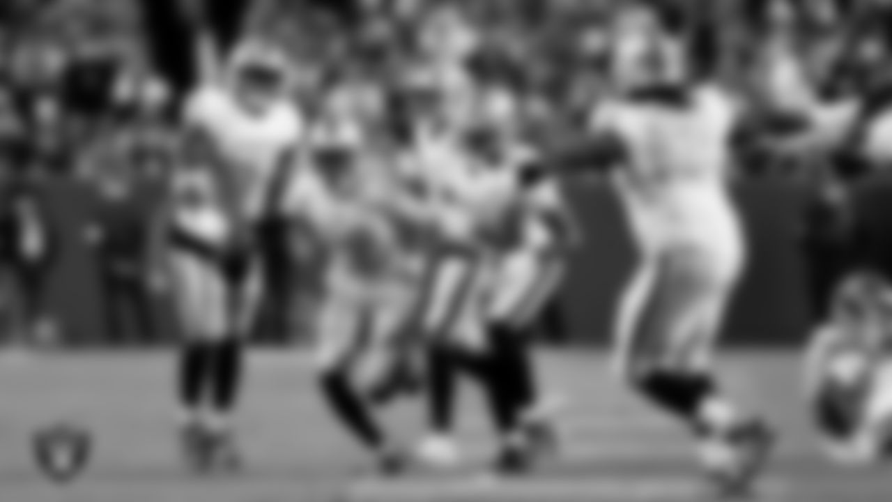 Las Vegas Raiders cornerback Kyu Blu Kelly (36) celebrates with teammates after intercepting a pass during the regular season away game against the Denver Broncos at Empower Field at Mile High.