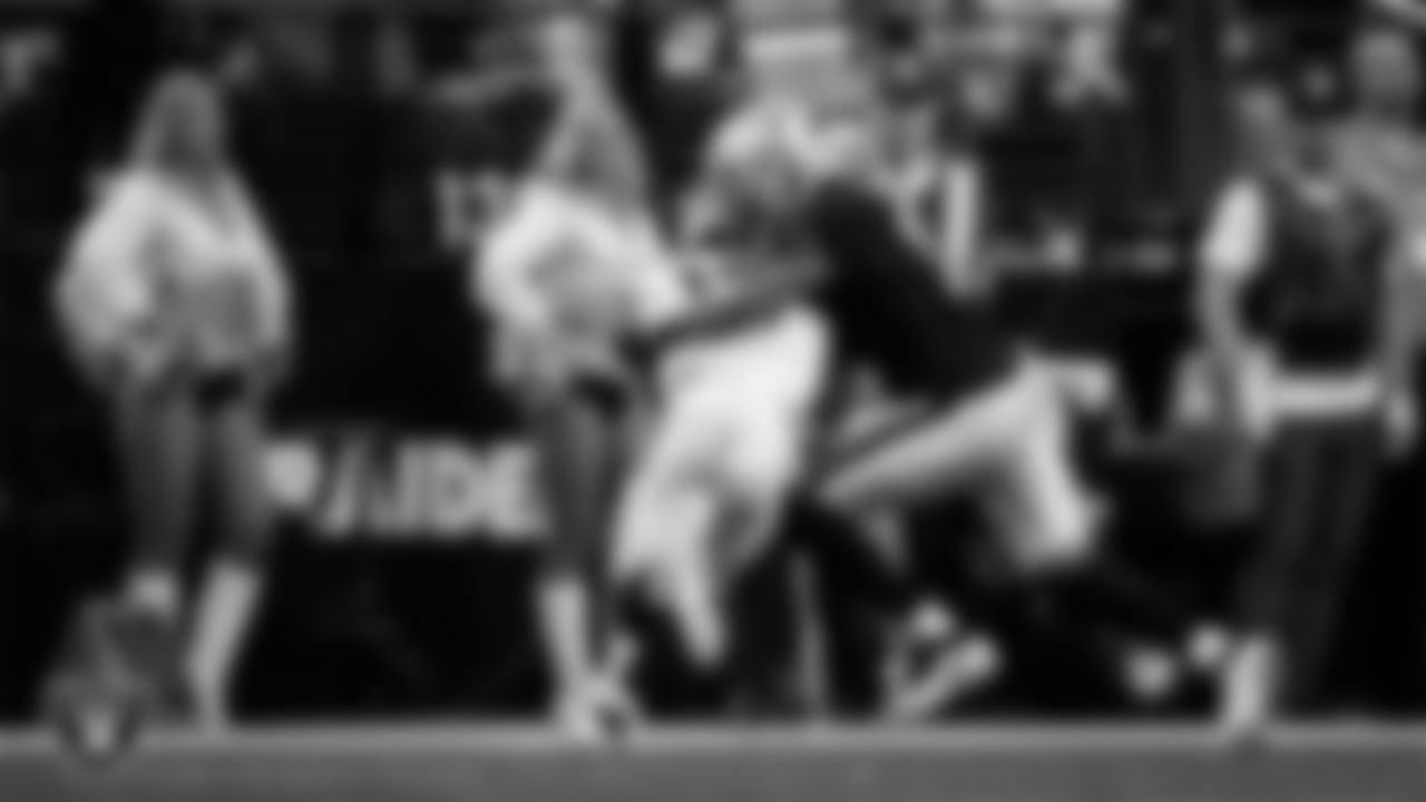 Las Vegas Raiders safety Jeremy Chinn (11) makes a tackle during the regular season home game against the Denver Broncos at Allegiant Stadium.