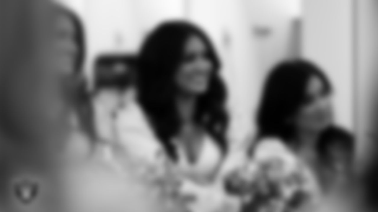 Raiderette Sloane in the locker room before the regular season home game against the Dallas Cowboys at Allegiant Stadium.