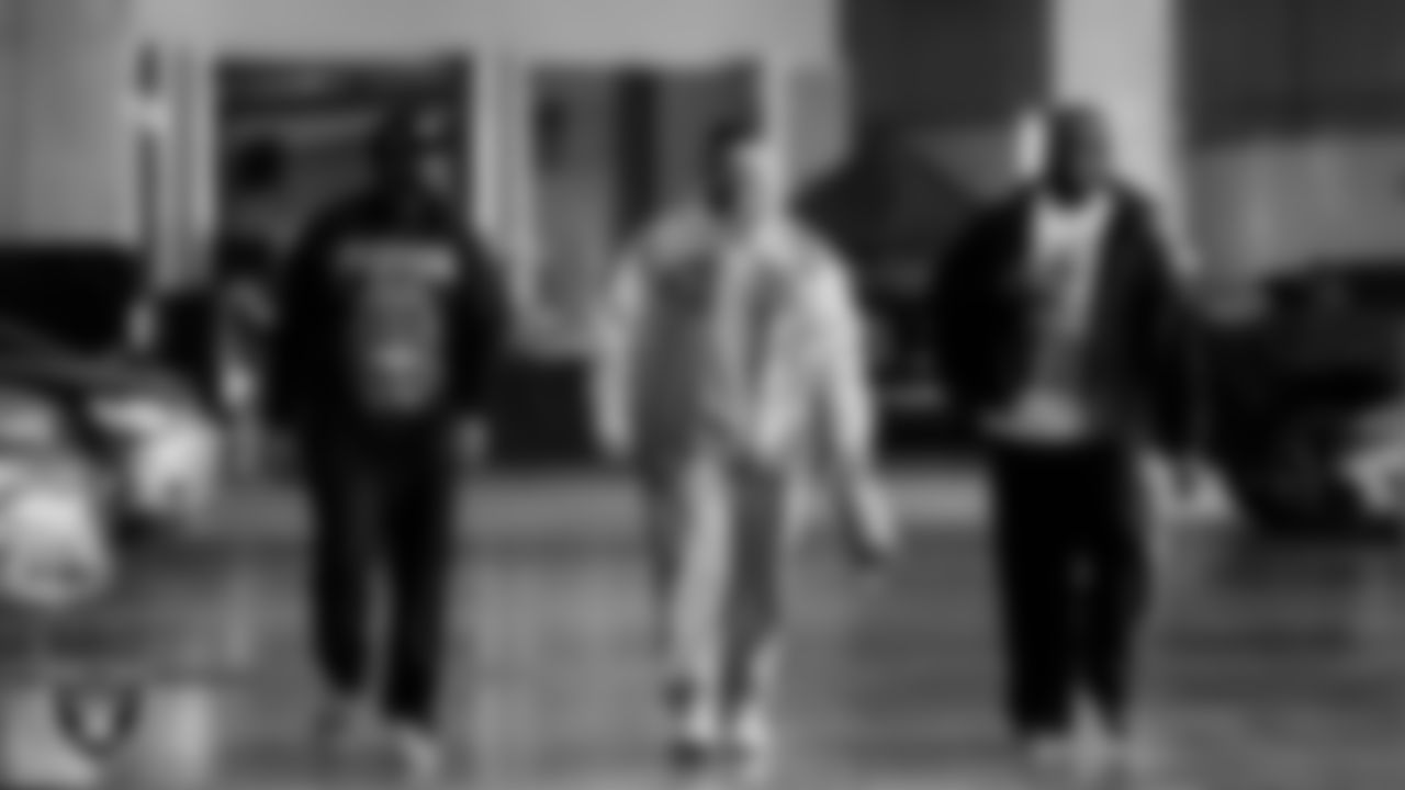 Las Vegas Raiders tackle Charles Grant (60), guard Atonio Mafi (56) and tackle DJ Glaze (71) arrive to the regular season home game against the Denver Broncos at Allegiant Stadium.