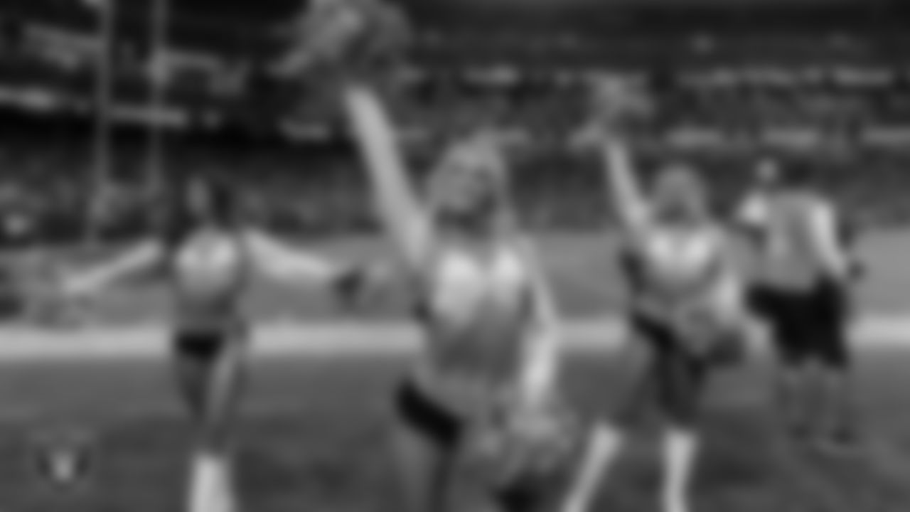 Raiderette Kennedy on the sidelines during the regular season home game against the Dallas Cowboys at Allegiant Stadium.