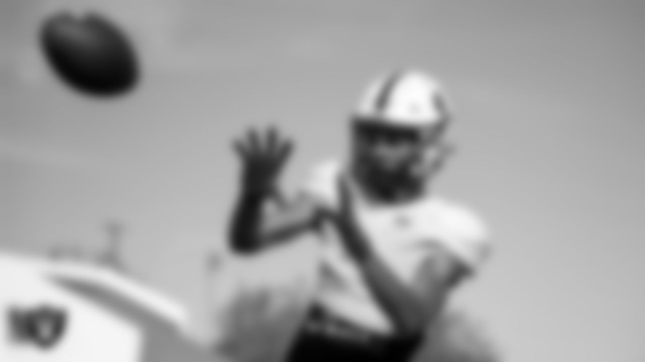 A member of the SLAM! Academy football team during practice at SLAM! Academy.