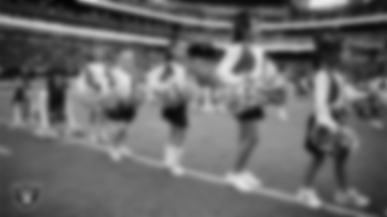Junior Raiderettes perform on the field before the preseason home game against the San Francisco 49ers at Allegiant Stadium.