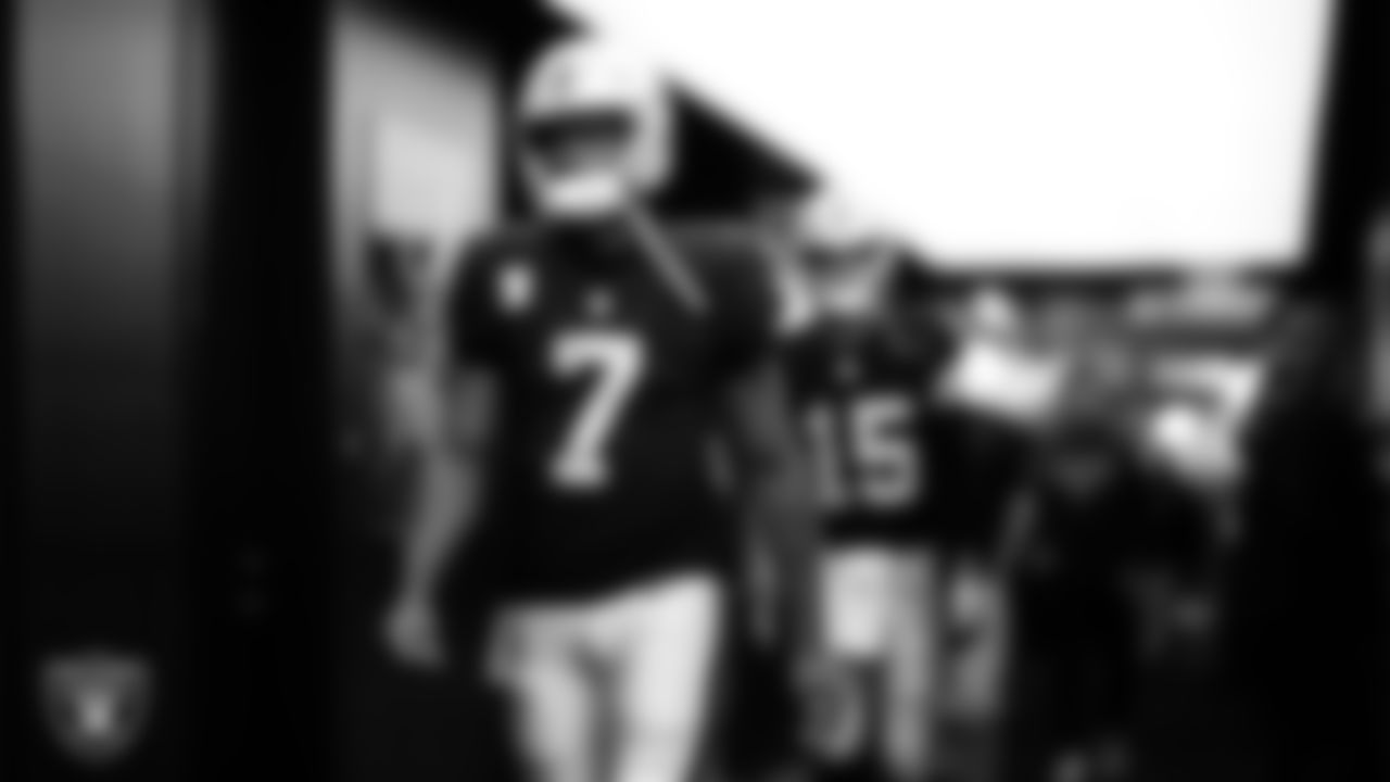 Las Vegas Raiders quarterback Geno Smith (7) walks down the tunnel before the regular season home game against the Dallas Cowboys at Allegiant Stadium.