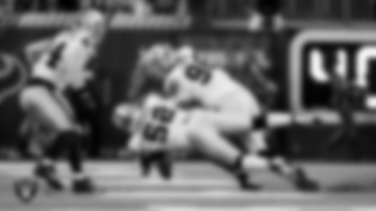 Las Vegas Raiders linebacker Elandon Roberts (52) and defensive tackle Jonah Laulu (96) during the regular season away game against the Houston Texans at NRG Stadium.