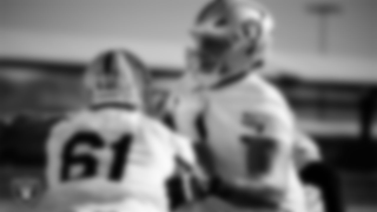 Las Vegas Raiders center/guard Jordan Meredith (61) and offensvie lineman Laki Tasi (79) during practice at Intermountain Health Performance Center.