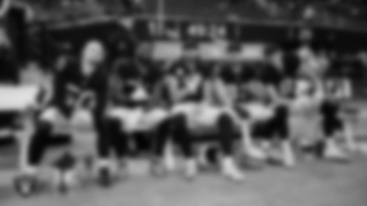 Las Vegas Raiders long snapper Jacob Bobenmoyer (50), running back Raheem Mostert (31), punter AJ Cole (6), running back Dylan Laube (23) and kicker Daniel Carlson (8) on the bench before the regular season home game against the Denver Broncos at Allegiant Stadium.