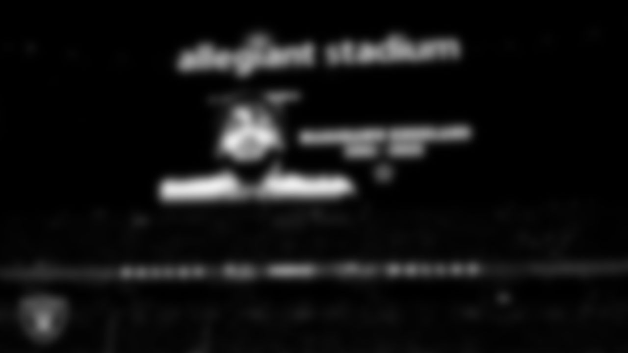 Dallas Cowboys defensive end Marshawn Kneeland is honored before the Las Vegas Raiders' regular season home game against the Dallas Cowboys at Allegiant Stadium.