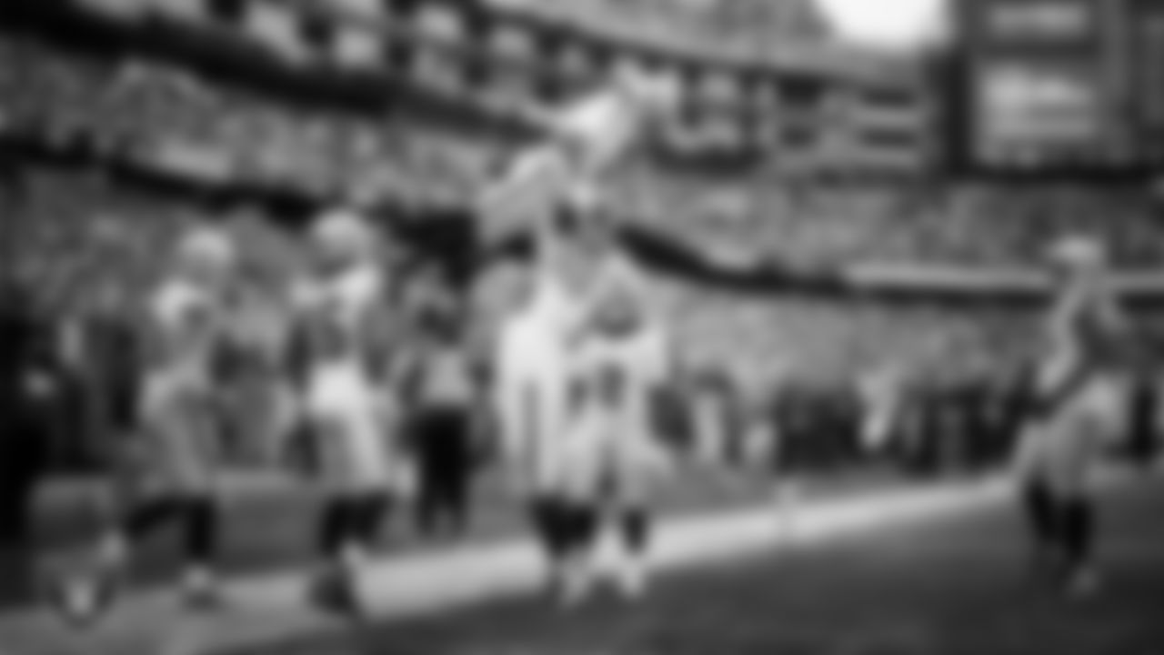 Las Vegas Raiders wide receiver Tre Tucker (1) celebrates with center Jackson Powers-Johnson (58) after making a 26-yard touchdown catch during the regular season away game against the New England Patriots at Gillette Stadium.