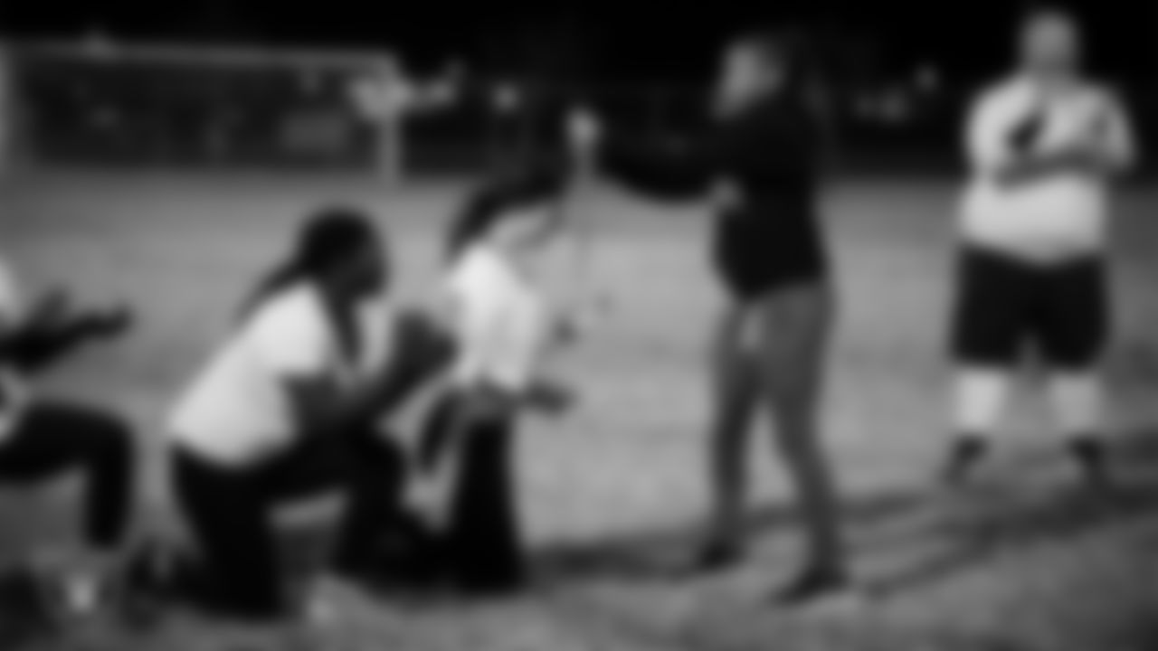 Las Vegas Raiders manager of football development Marli Bartlett presents the MVP chain to Emily Lomeli of SLAM! Nevada after the Raiders' High School Flag Football Showcase game at Russel Road Recreational Complex.