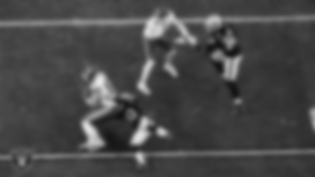 Las Vegas Raiders cornerback Darnay Holmes (30) makes a tackle during the regular season home game against the Kansas City Chiefs at Allegiant Stadium.