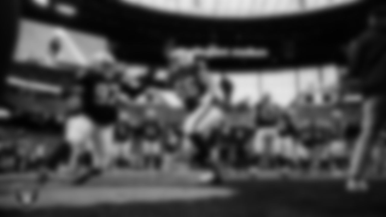 Las Vegas Raiders defensive tackle Tonka Hemingway (97) and guard Atonio Mafi (56) warming up before the regular season home game against the New York Giants at Allegiant Stadium.