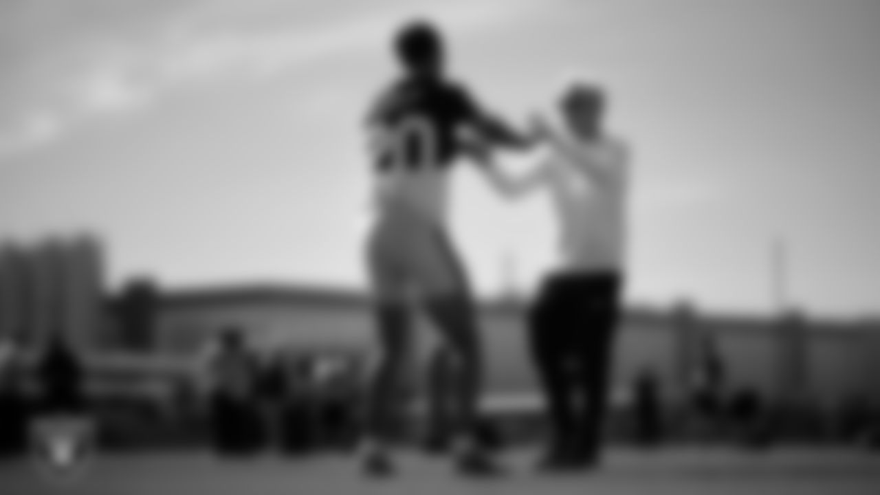 Las Vegas Raiders safety Isaiah Pola-Mao (20) and Head Coach Pete Carroll at a workout during phase two of the offseason program at Intermountain Health Performance Center.