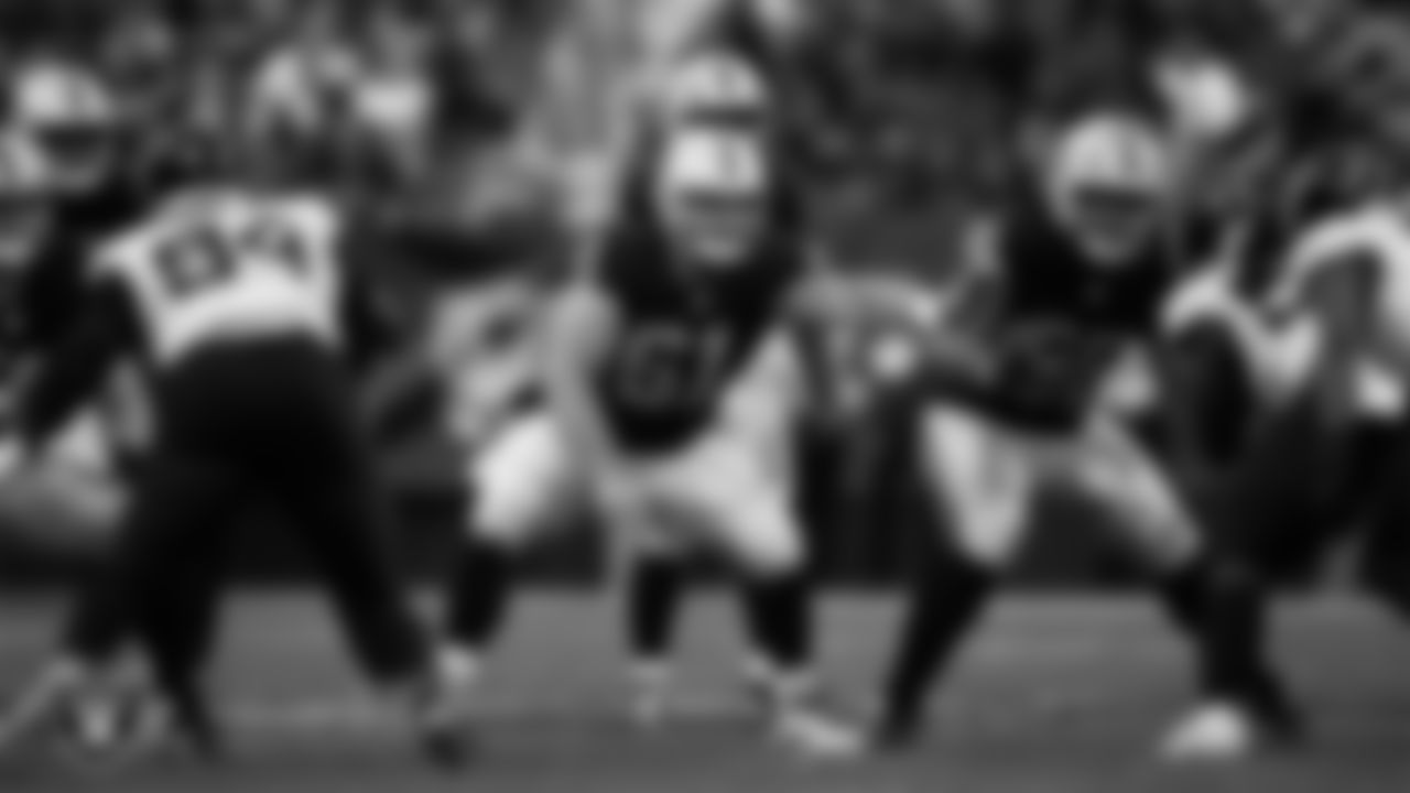 Las Vegas Raiders center/guard Jordan Meredith (61) and guard Dylan Parham (66) block during the regular season home game against the Jacksonville Jaguars at Allegiant Stadium.