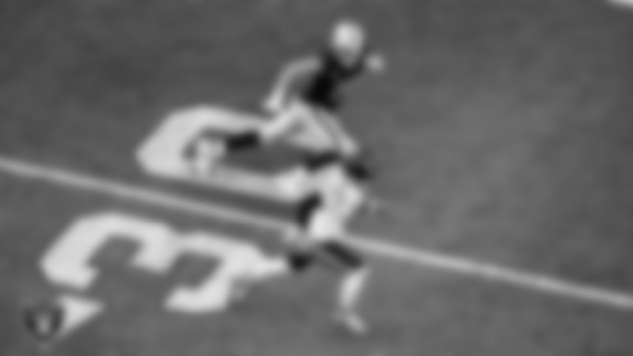 Las Vegas Raiders defensive end Maxx Crosby (98) pressures the quarterback during the regular season home game against the Chicago Bears at Allegiant Stadium.