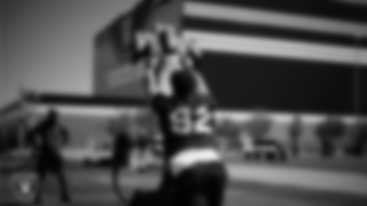 Las Vegas Raiders linebacker Elerson Smith (92) at a workout during phase two of the offseason program at Intermountain Health Performance Center.