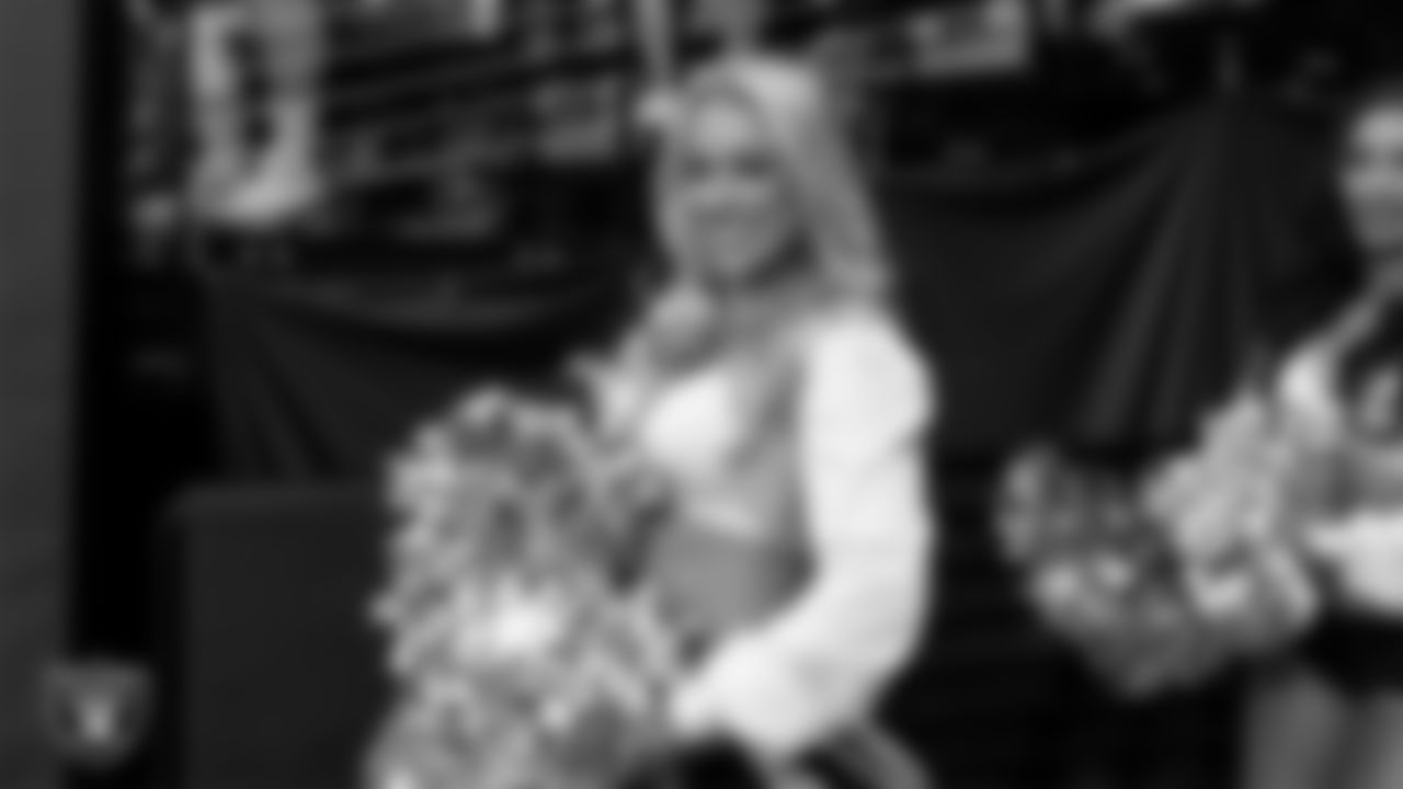 Raiderette Delaney walks through the tunnel before the regular season home game against the Jacksonville Jaguars at Allegiant Stadium.