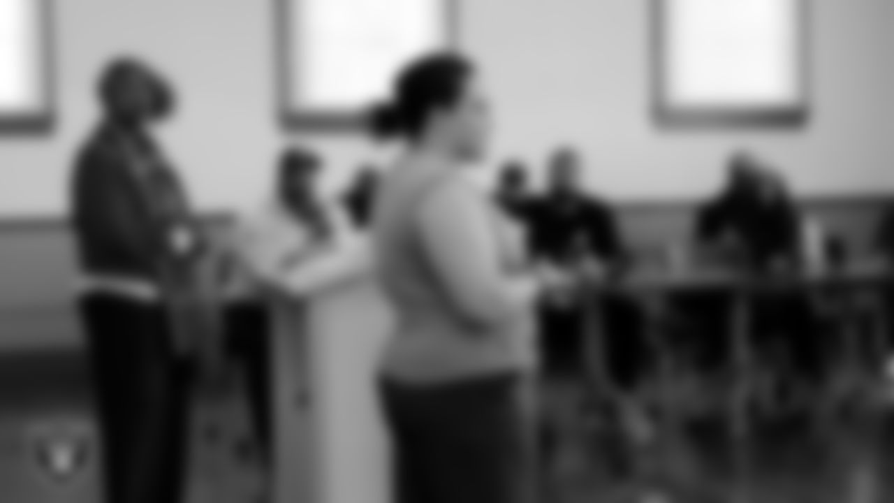 Tech Impact workforce programs manager Amy Starling speaks to attendees as they tour the Historic Westside School during the Historic Westside Tour.