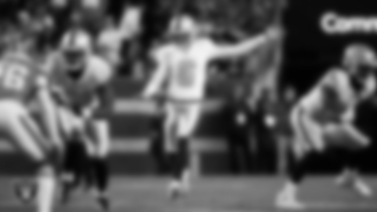 Las Vegas Raiders punter AJ Cole (6) punts during the regular season away game against the Denver Broncos at Empower Field at Mile High.