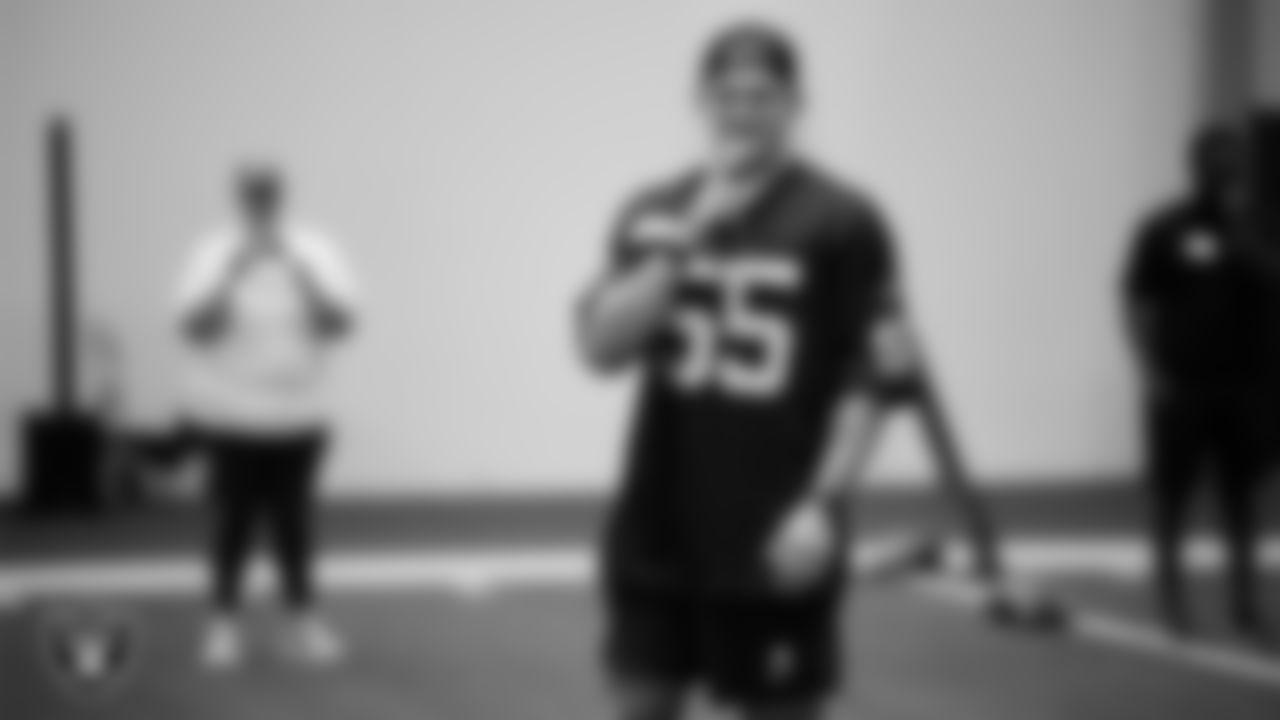 Las Vegas Raiders linebacker Cody Lindenberg (55) speaks to athletes at a skills camp during Play Football Day at Intermountain Health Performance Center.